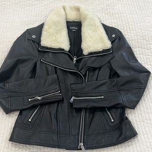 Brand New without tags Bebe leather jacket with fur collar size M